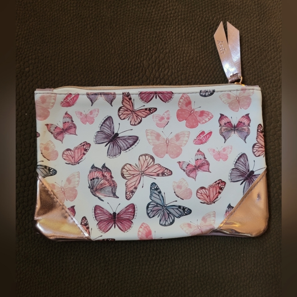 GUC. Ipsy Lavender, pink, and white butterfly makeup bag. Super cute